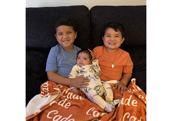 Baby Cade with his two brothers